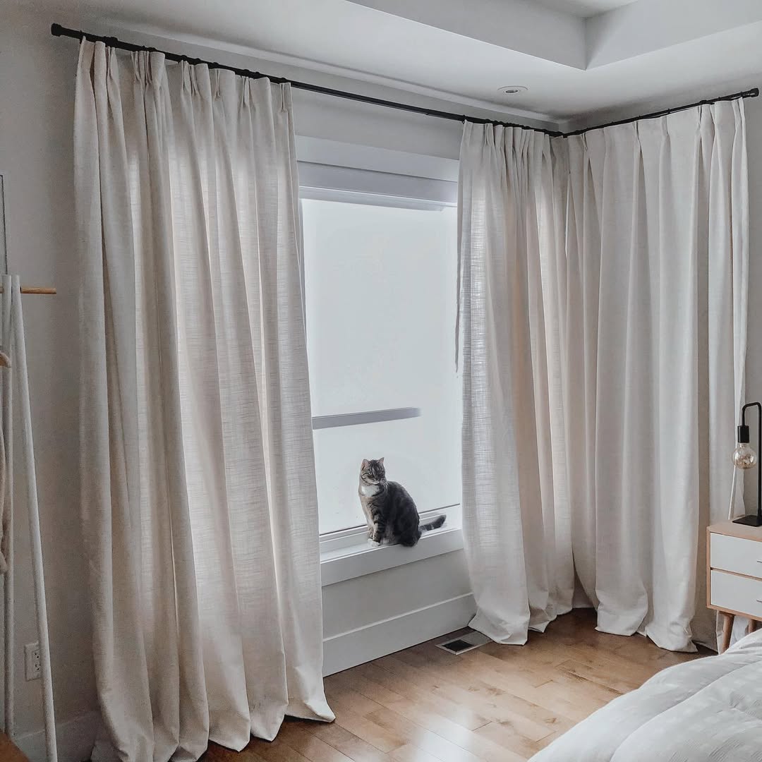 Pleated Linen Curtains Soften a Window Corner