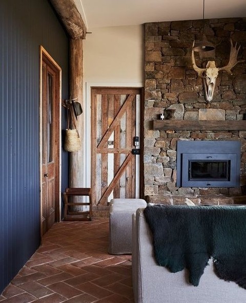 Rustic Wooden Door with Diagonal Brace Adds Farmhouse Charm