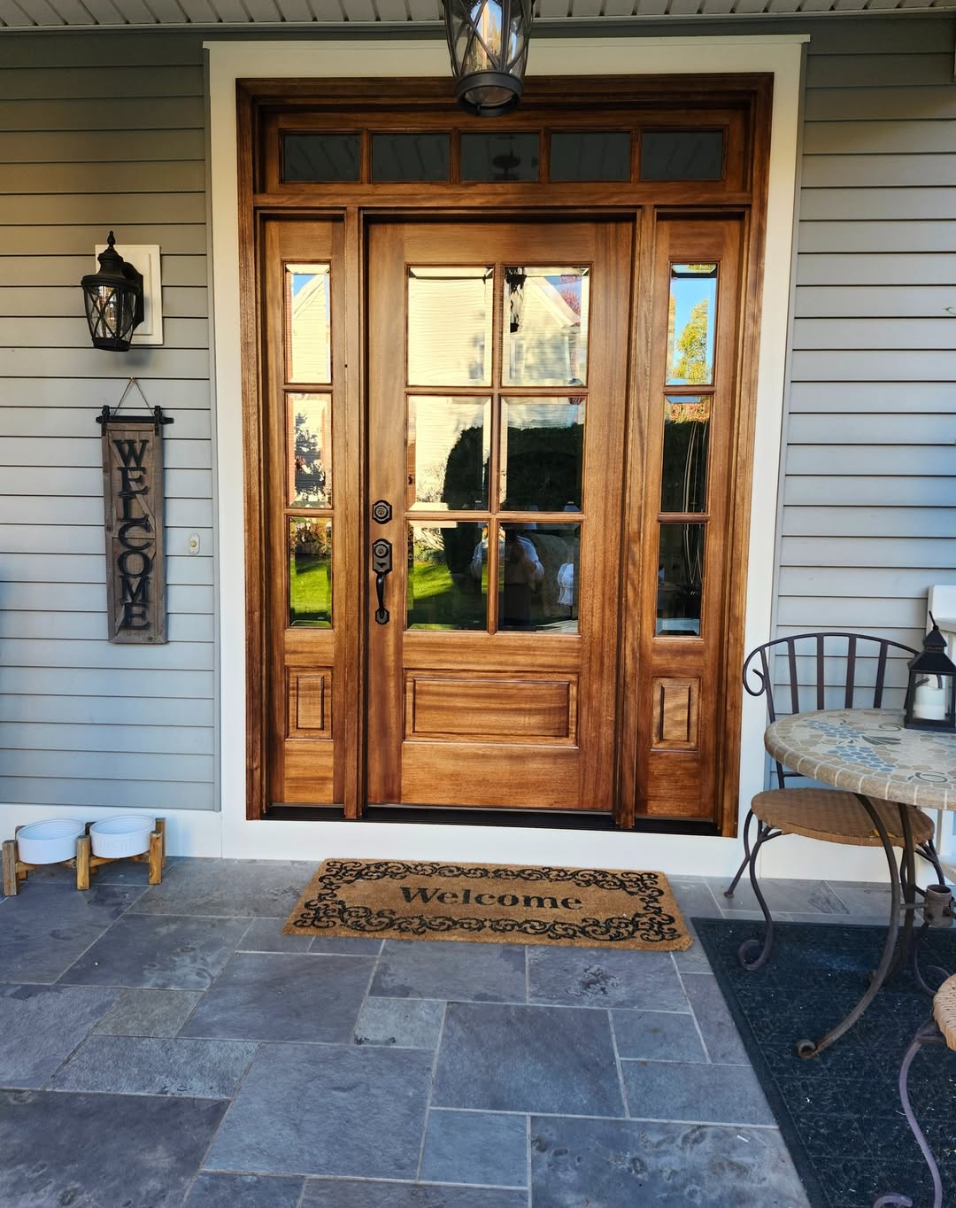 Wooden Double Doors with Paned Glass Offer Natural Light