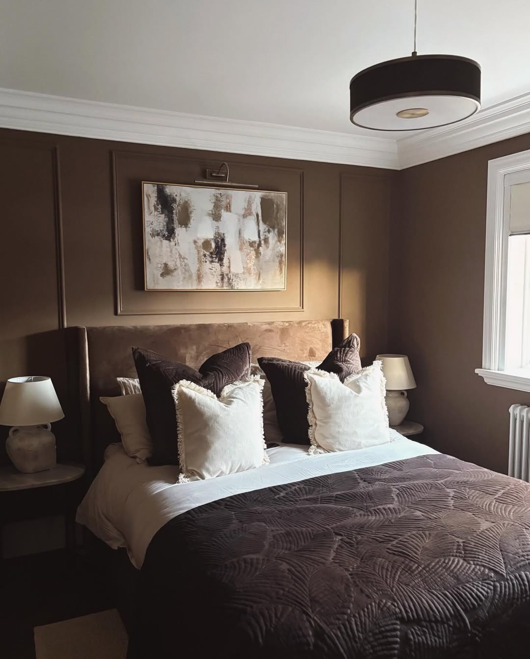 Abstract Artwork Adds Textured Focal Point Above Bed