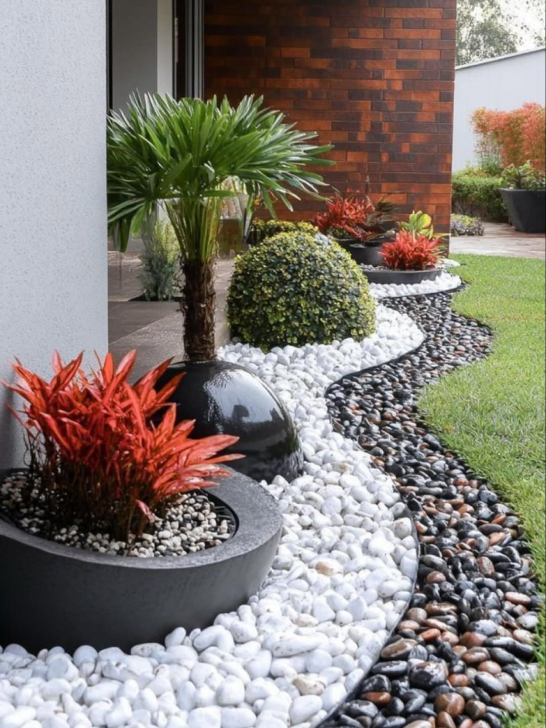 Curving Paths With Contrasting River Rock Borders