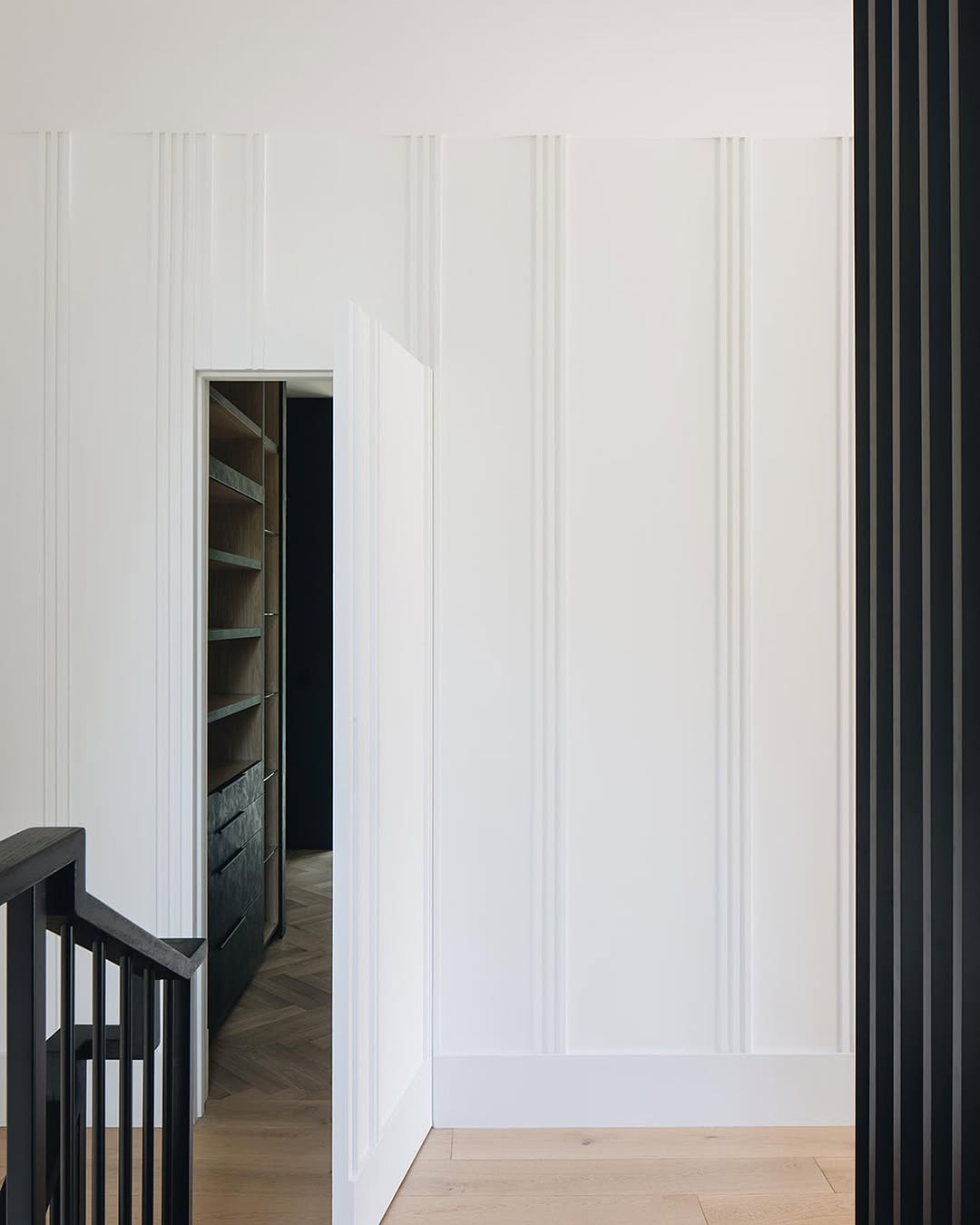 Fluted Wall Panels Hide a Closet
