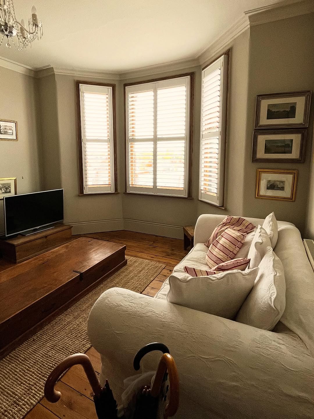 White Plantation Shutters Offer Versatile Light Control