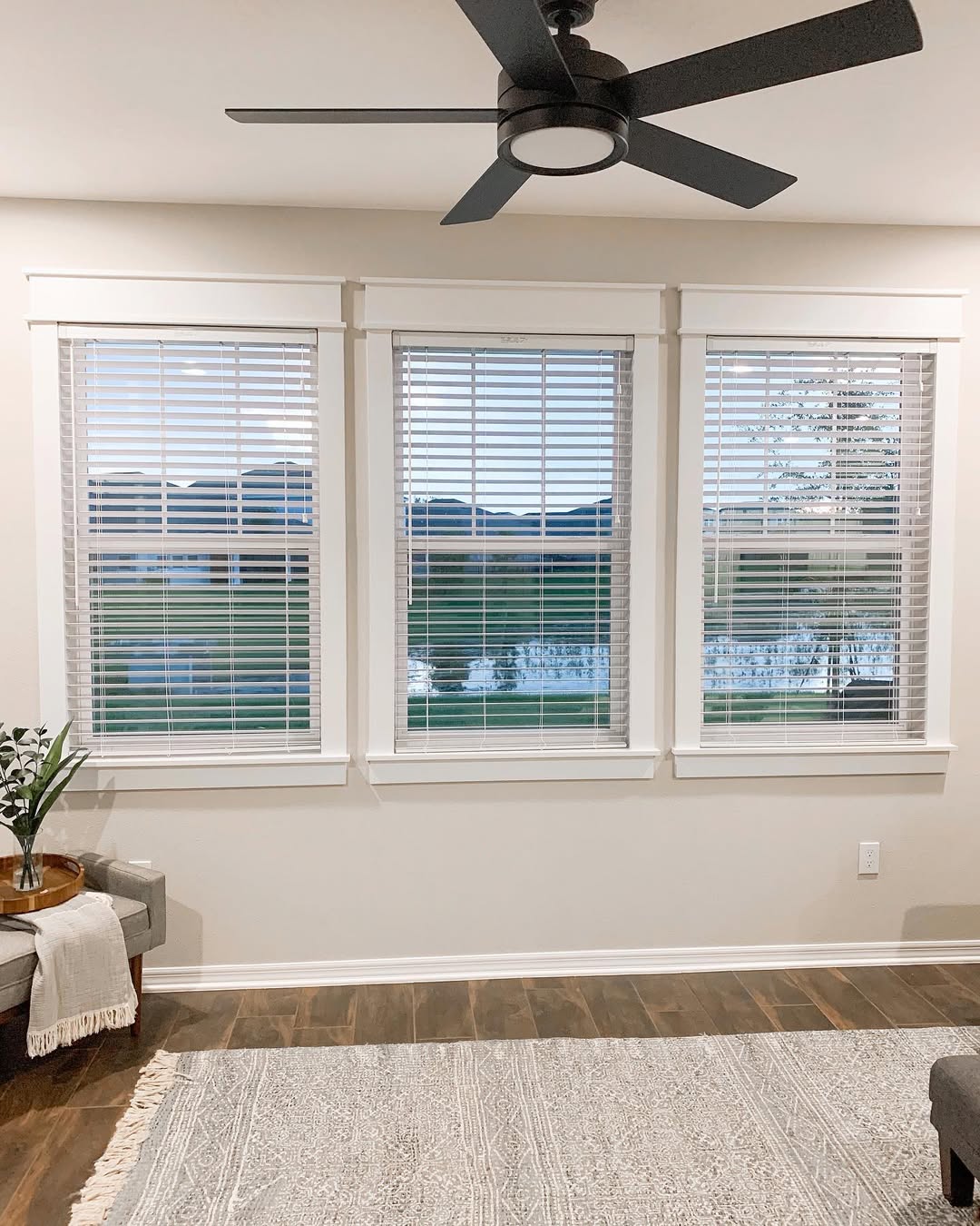 Layered White Trim Frames Triple Window