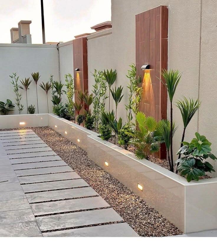 Integrated Pathway Lights Define Modern Stone and Gravel Garden