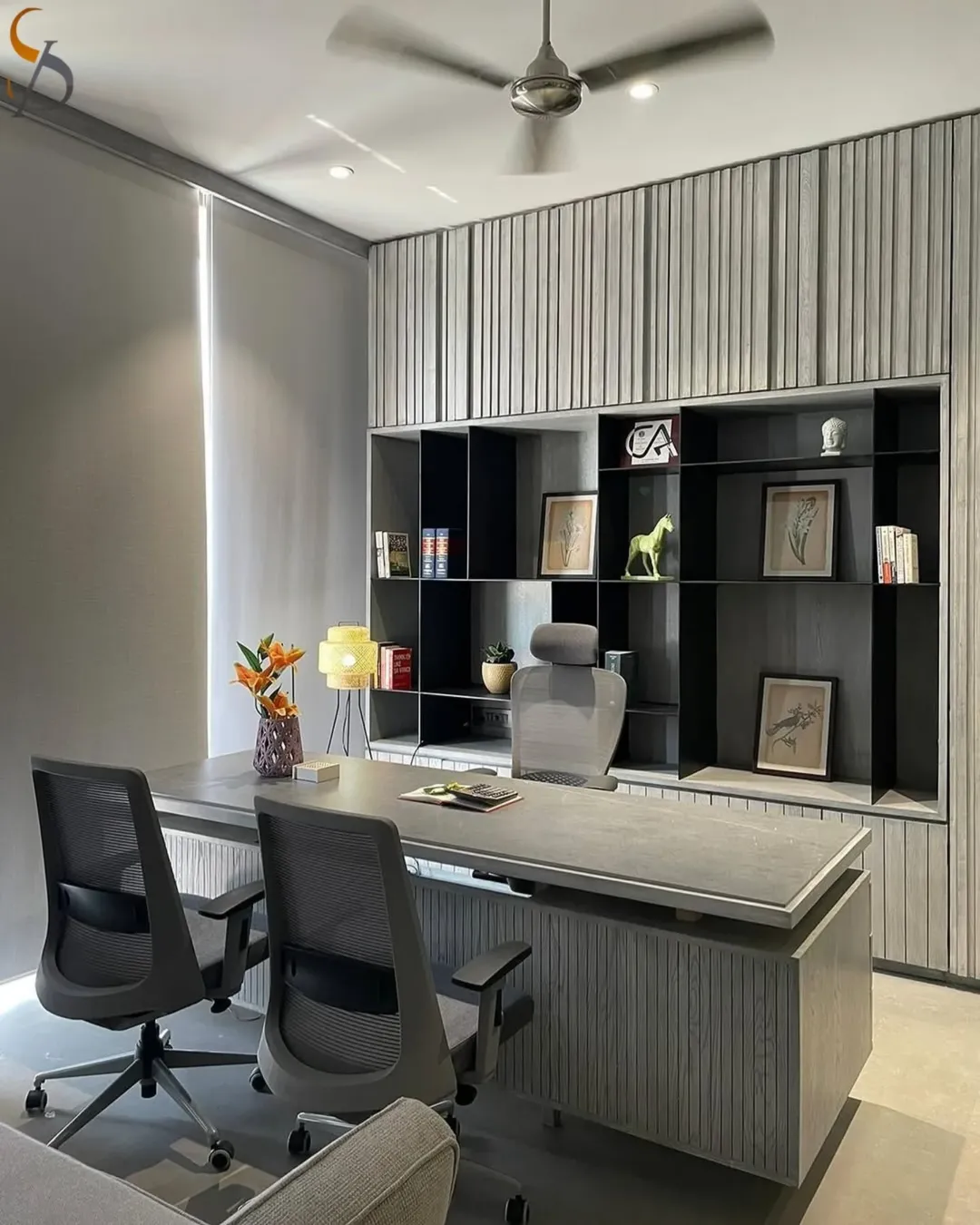 Textured Wood Panels Create a Modern Backdrop for Shelving