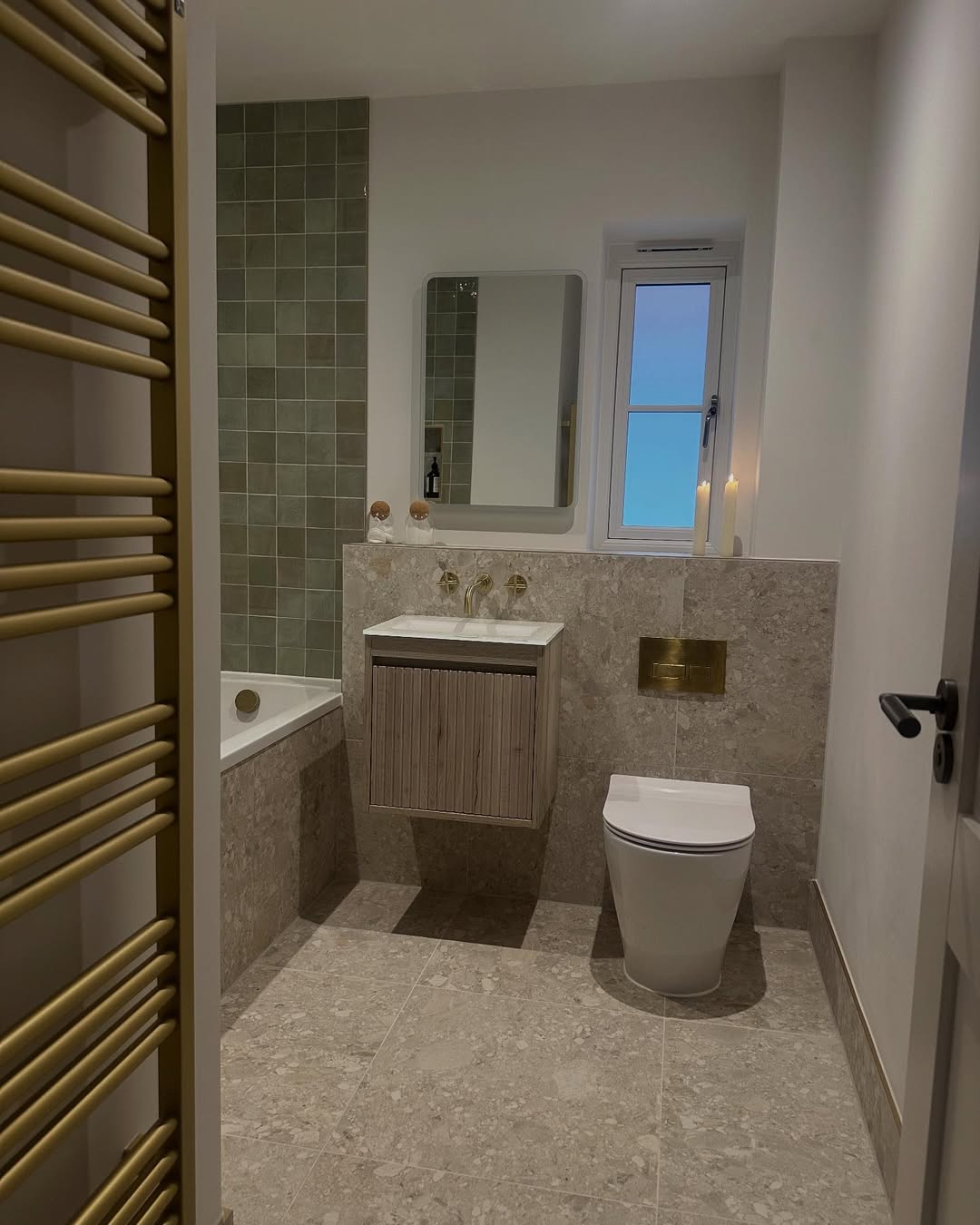 Vertical Wood Slat Cabinet Adds Natural Warmth to Vanity