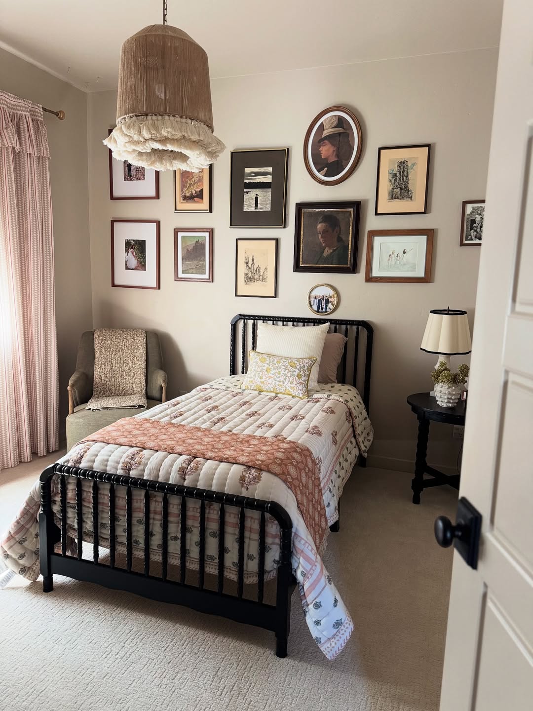 Gallery Wall Groupings Add Personality Above a Bed