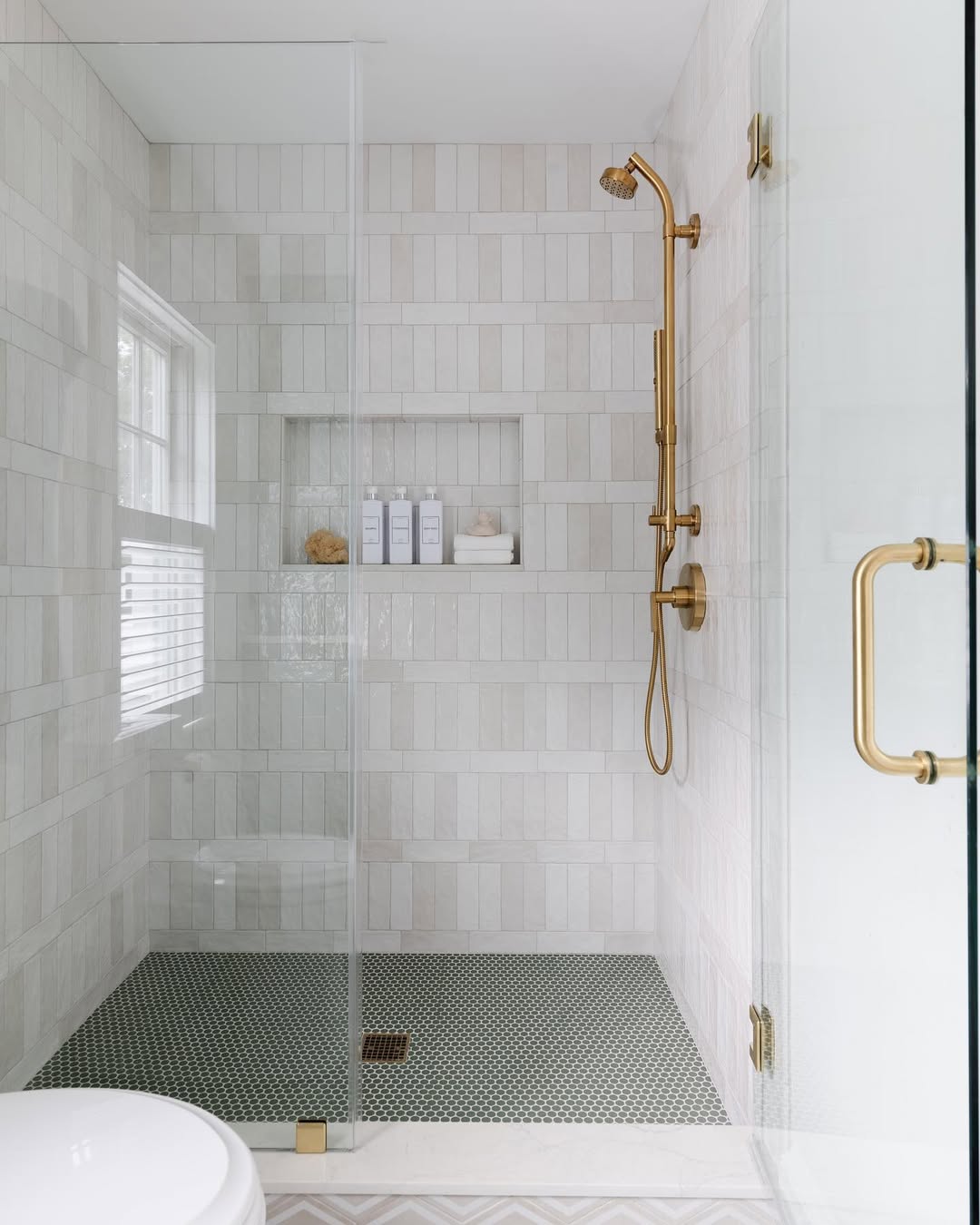 Shower Floor Inlaid With Dark Hexagonal Tiles