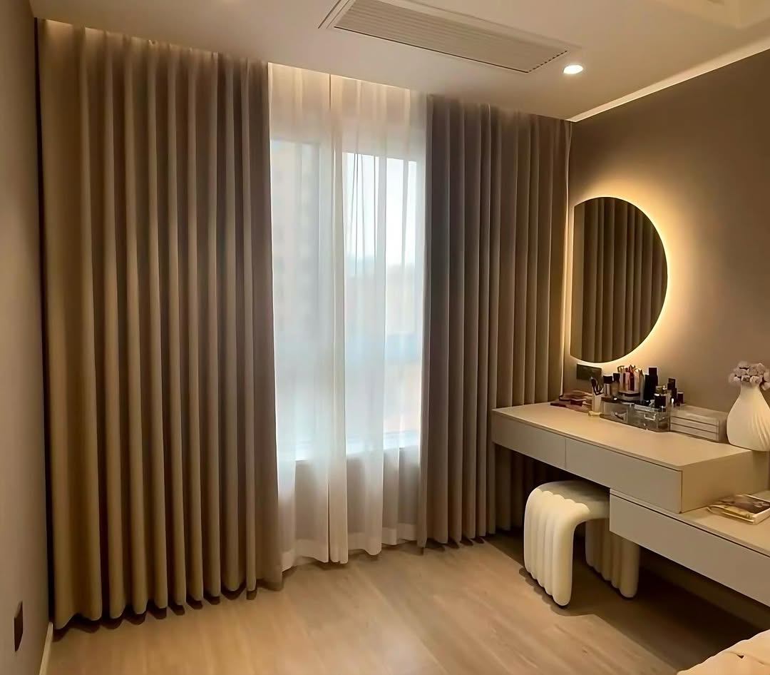 Layer Sheer Curtains Under Heavier Drapes for Soft Light
