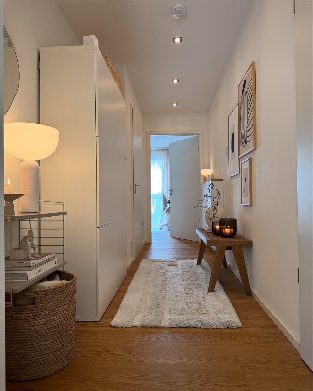 Wooden Bench With Amber Glass Lanterns Creates Cozy Entryway