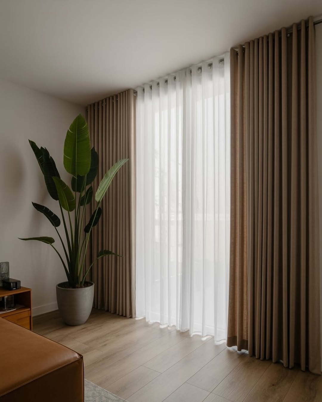 Layer Two Tones of Neutral Drapes for Subtle Dimension