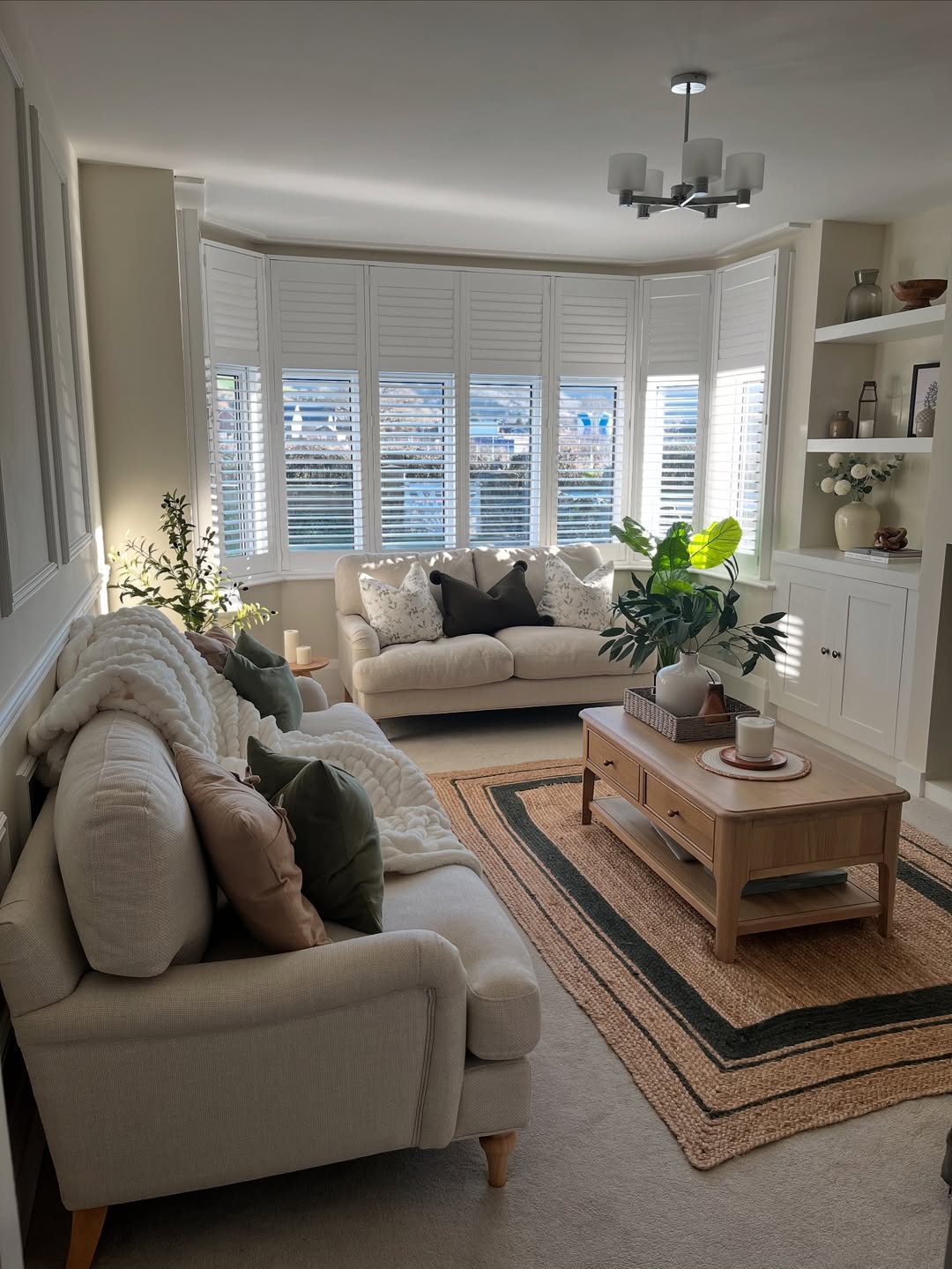 Anchor Your Seating With a Jute Rug and Dark Border