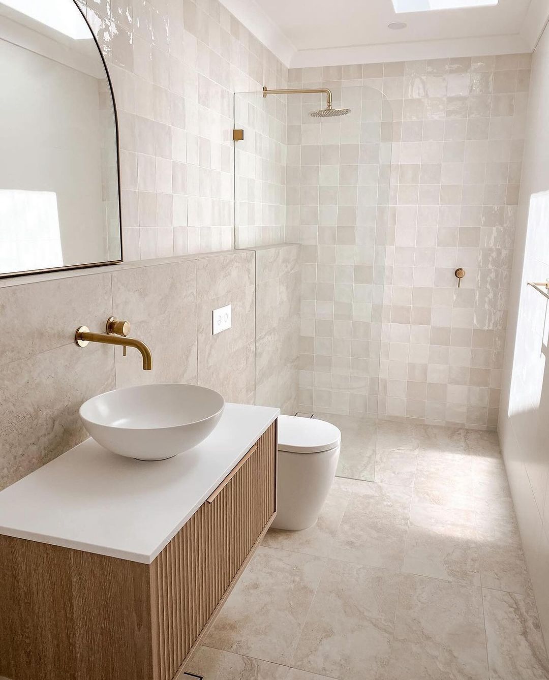 Square Shower Tiles With Subtle Variations Create Gentle Texture