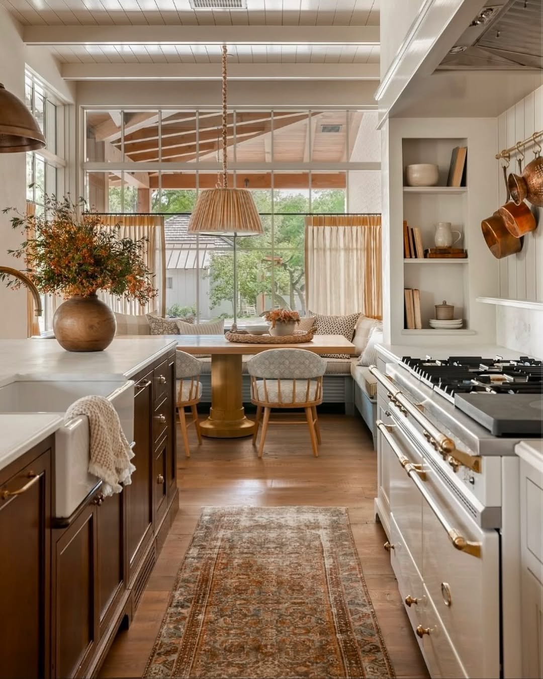 Copper Pots Hung on Pegs Add Warmth and Texture