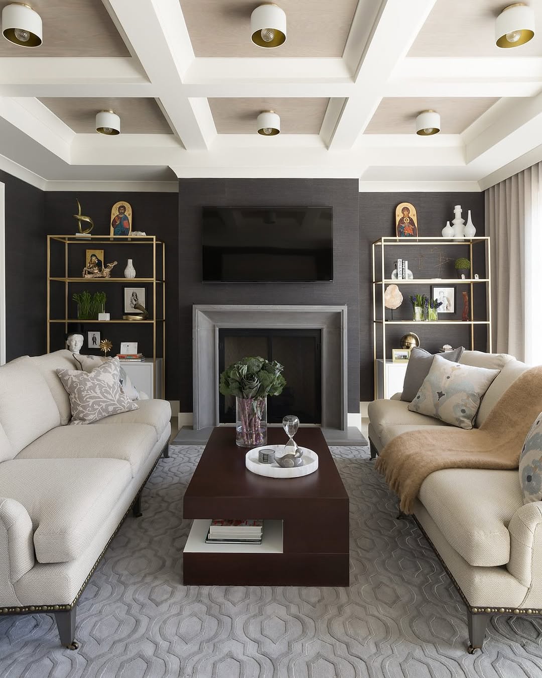 Gold Etched Bookshelves Add Glamour to Dark Walls
