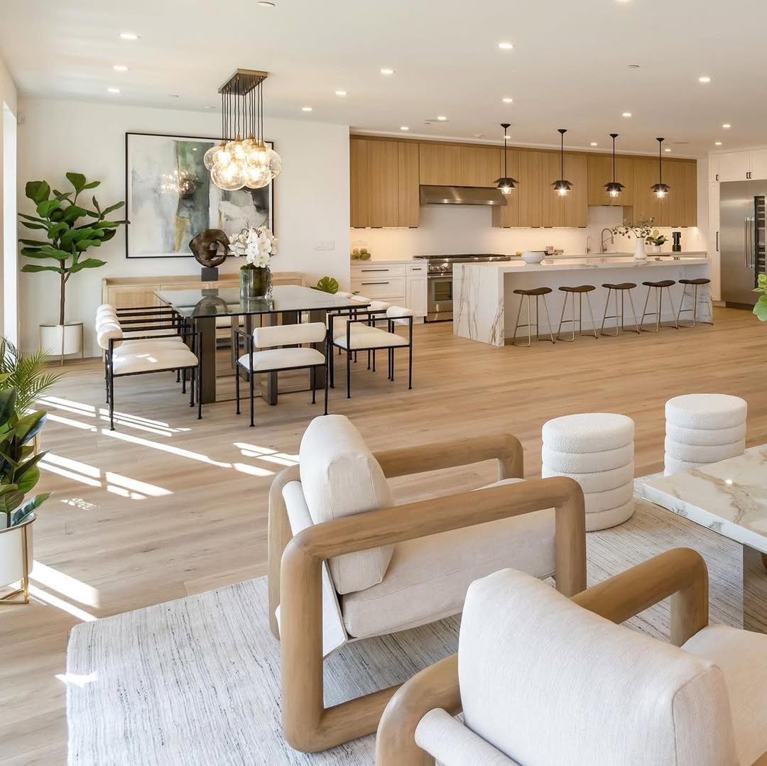 Anchor Your Dining Area with a Glass Table and Sculptural Base