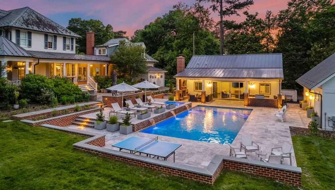 Rectangular Ping Pong Table Creates Play Zone Near Pool
