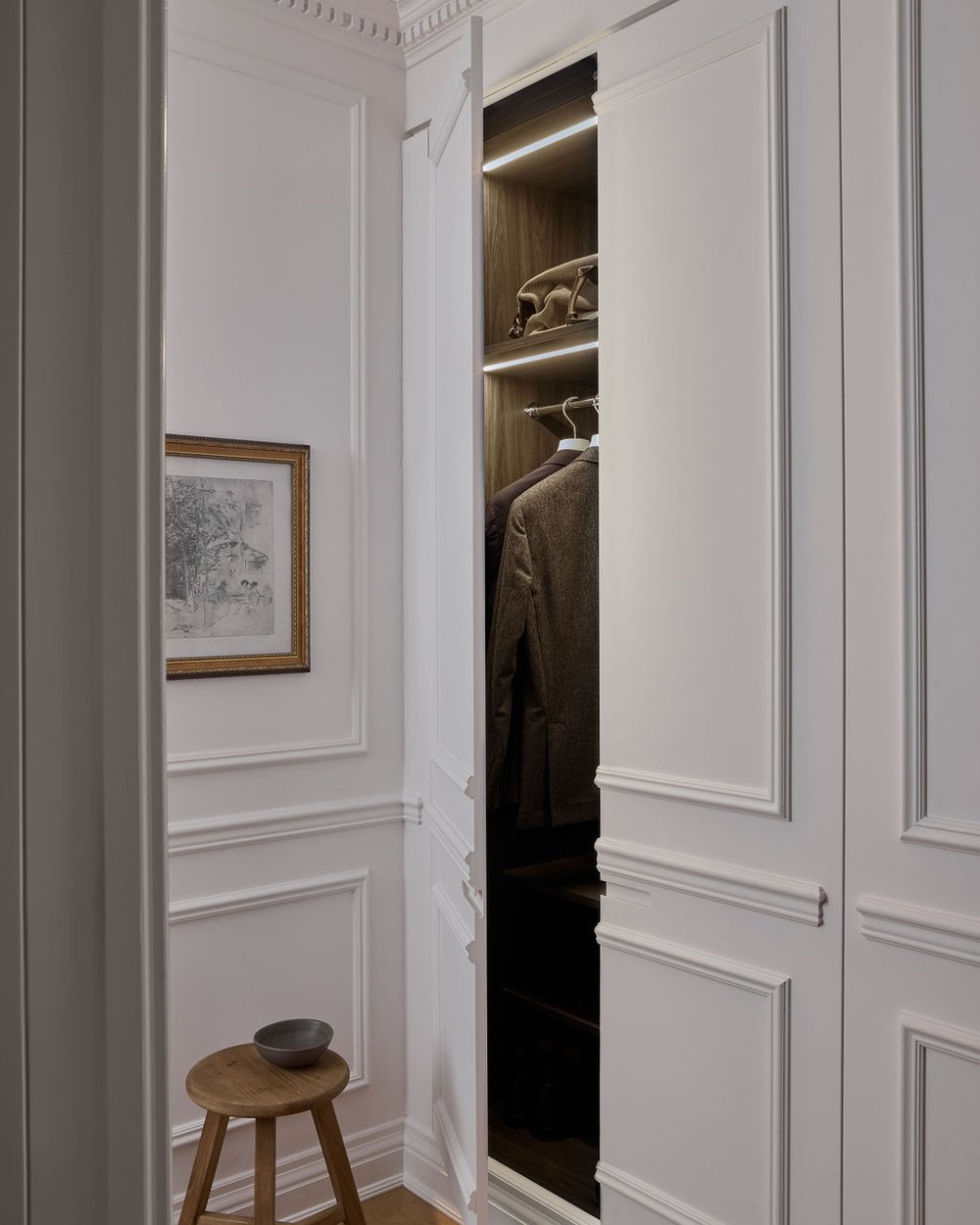 Paneled Doors Conceal Integrated Closet Lighting