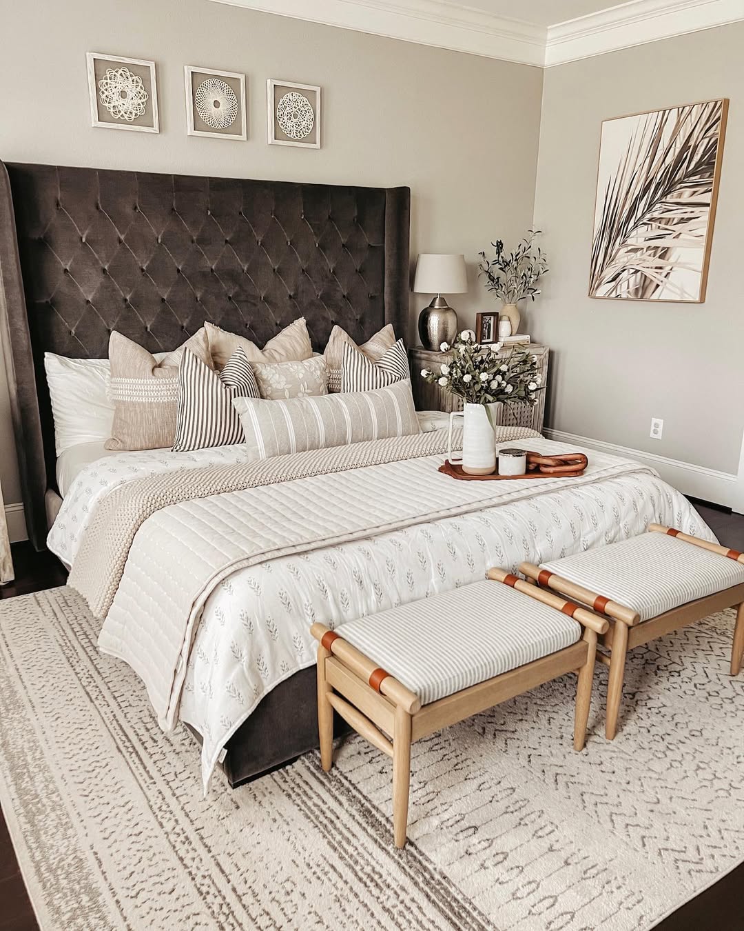 Pair of Wooden Benches Add Striped Seating at Foot of Bed