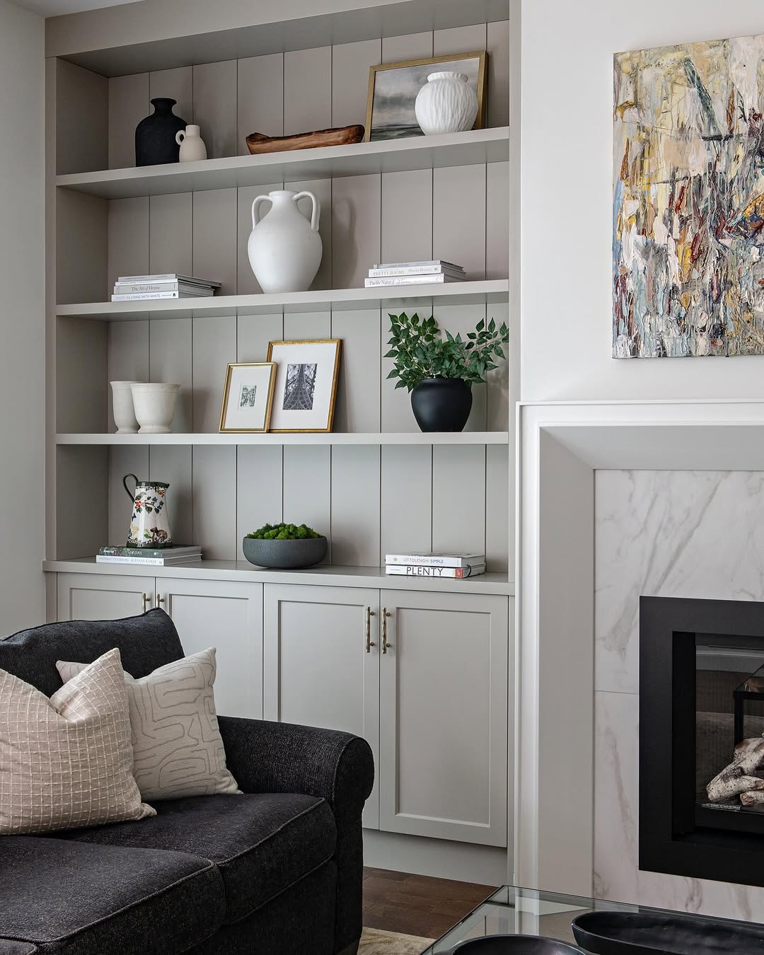 Grouped Framed Photos Add Personal Touches to Shelves