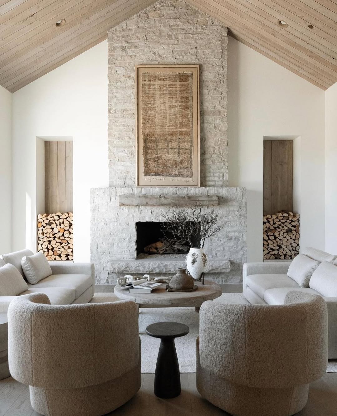 Stacked Firewood Creates Visual Balance Beside Fireplace