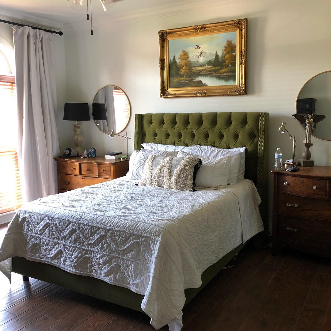 Tufted Olive Headboard Anchors a Cozy Bedroom
