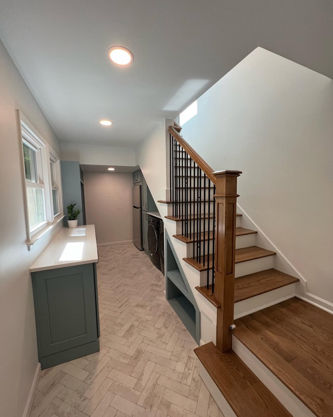 Built-in Niches Under Stairs for Laundry Supplies
