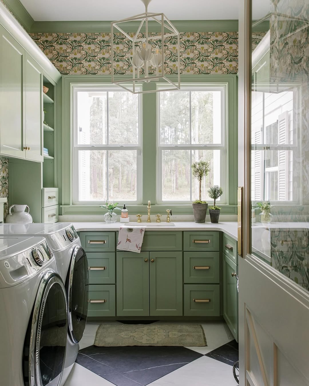 Calming Green Shaker Cabinets with Brass Hardware
