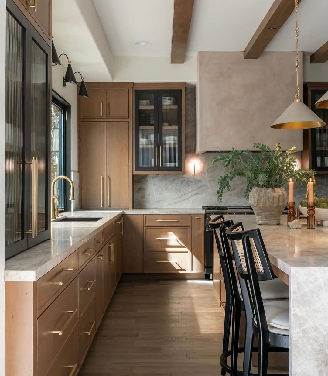 Black Cane Bar Stools Add Graphic Contrast to Island