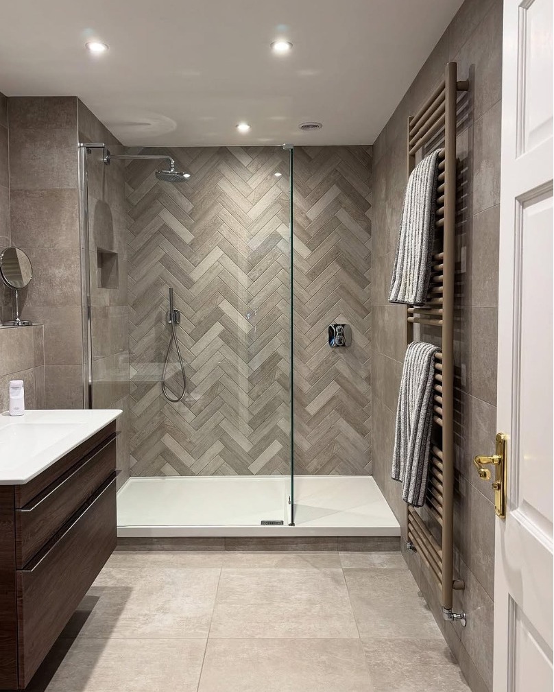 Wood-Look Herringbone Tile Adds Warmth to Your Shower