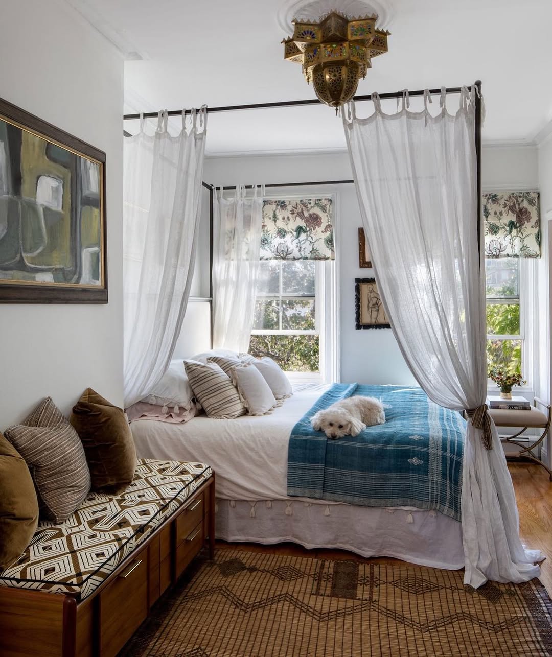 Sheer Drapes Soften a Four-Poster Bed