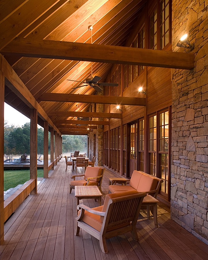 Wooden Porch Furniture With Orange Cushions Creates Outdoor Seating