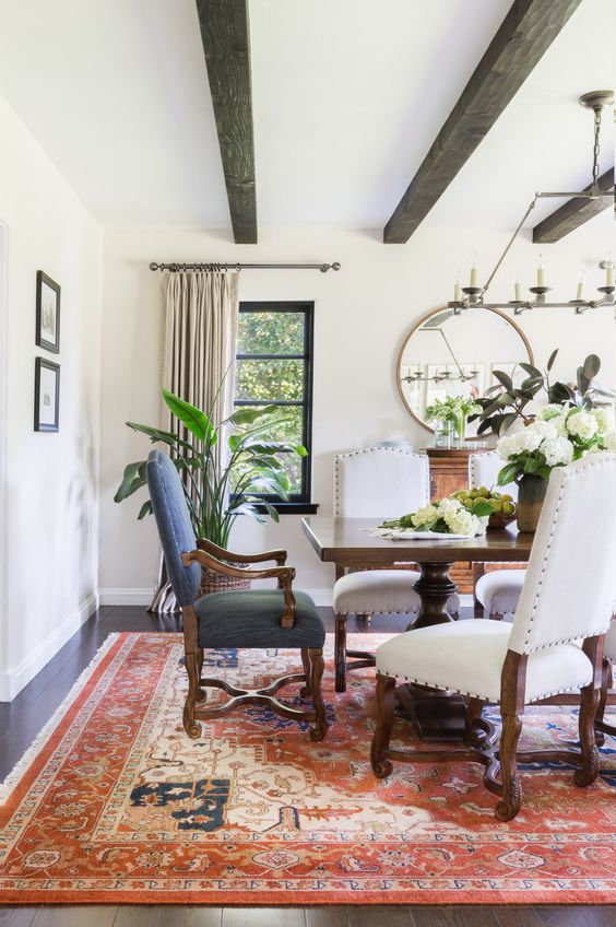 Exposed Dark Wood Beams Add Character to White Ceilings