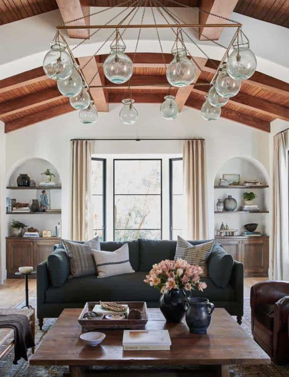 Glass Globe Pendants Add Airy Texture to Wood Beams