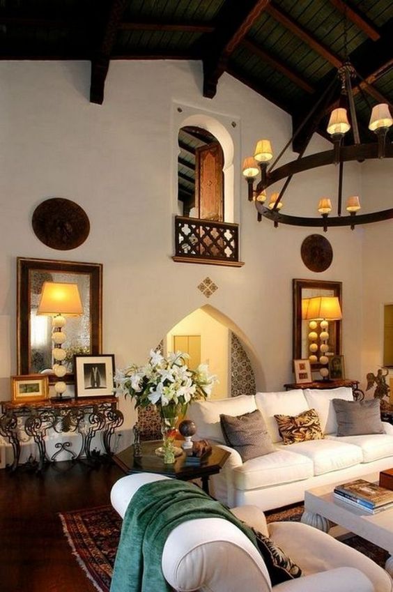 Place Mirrored Console Tables Beside Arched Doorways