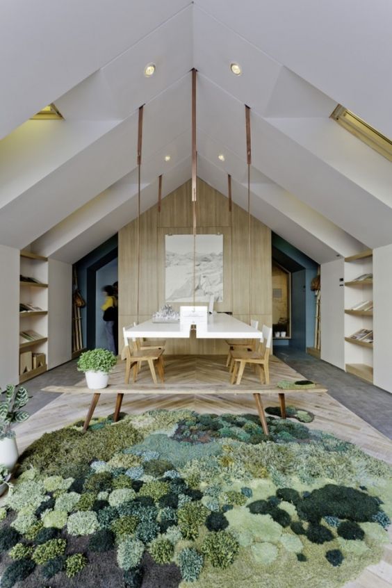 Textured Moss Rugs Create an Organic Forest Floor