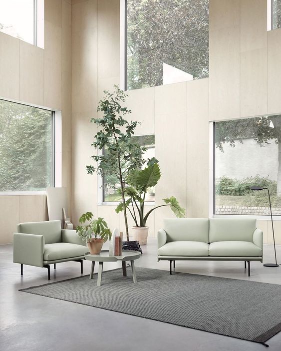 Low Round Table With Sculptural Plants Adds Softness