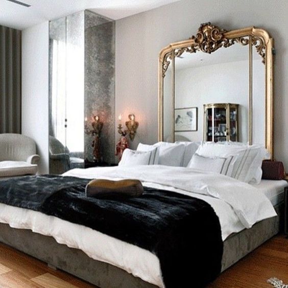 Frame a Tall Headboard with an Ornate Gold Mirror