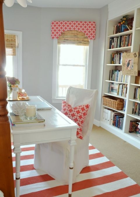 Coral and White Geometric Pillow Brightens a Workspace