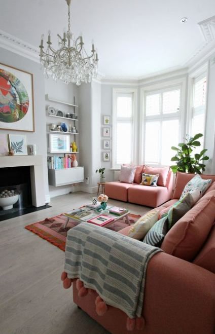 Coral Sectional Sofa with Patterned Pillows Adds Cozy Texture