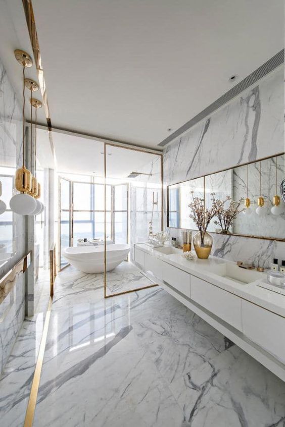 Gold-Trimmed Glass Enclosure for a Freestanding Tub