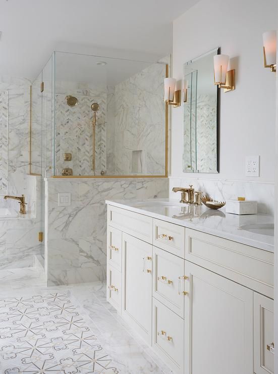 Gold Trimmed Glass Shower Enclosure Defines Space