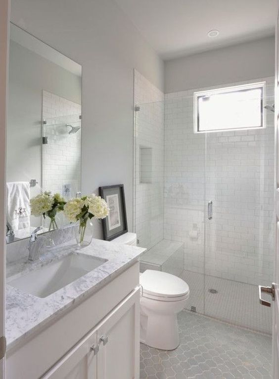 Framed Artwork Adds a Personal Touch on the Toilet Tank