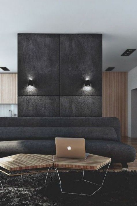 Textured Dark Wall Panels Create a Dramatic Backdrop
