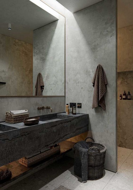 Woven Baskets Soften a Concrete Bathroom