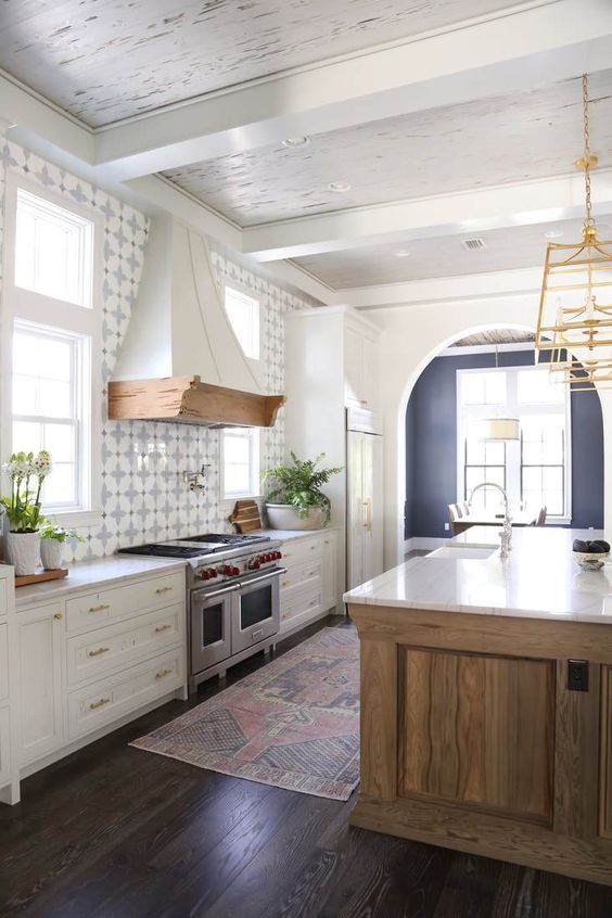 Patterned Tile Backsplash Adds Geometric Interest Behind Stove