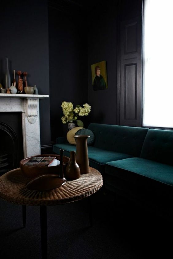 Group Dark Vases on a Woven Table for Sculptural Interest