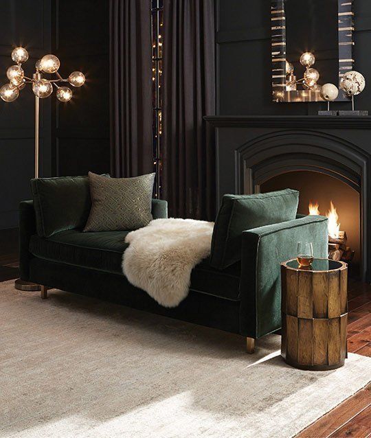Textured Barrel Table Adds Warmth Next to Velvet Sofa