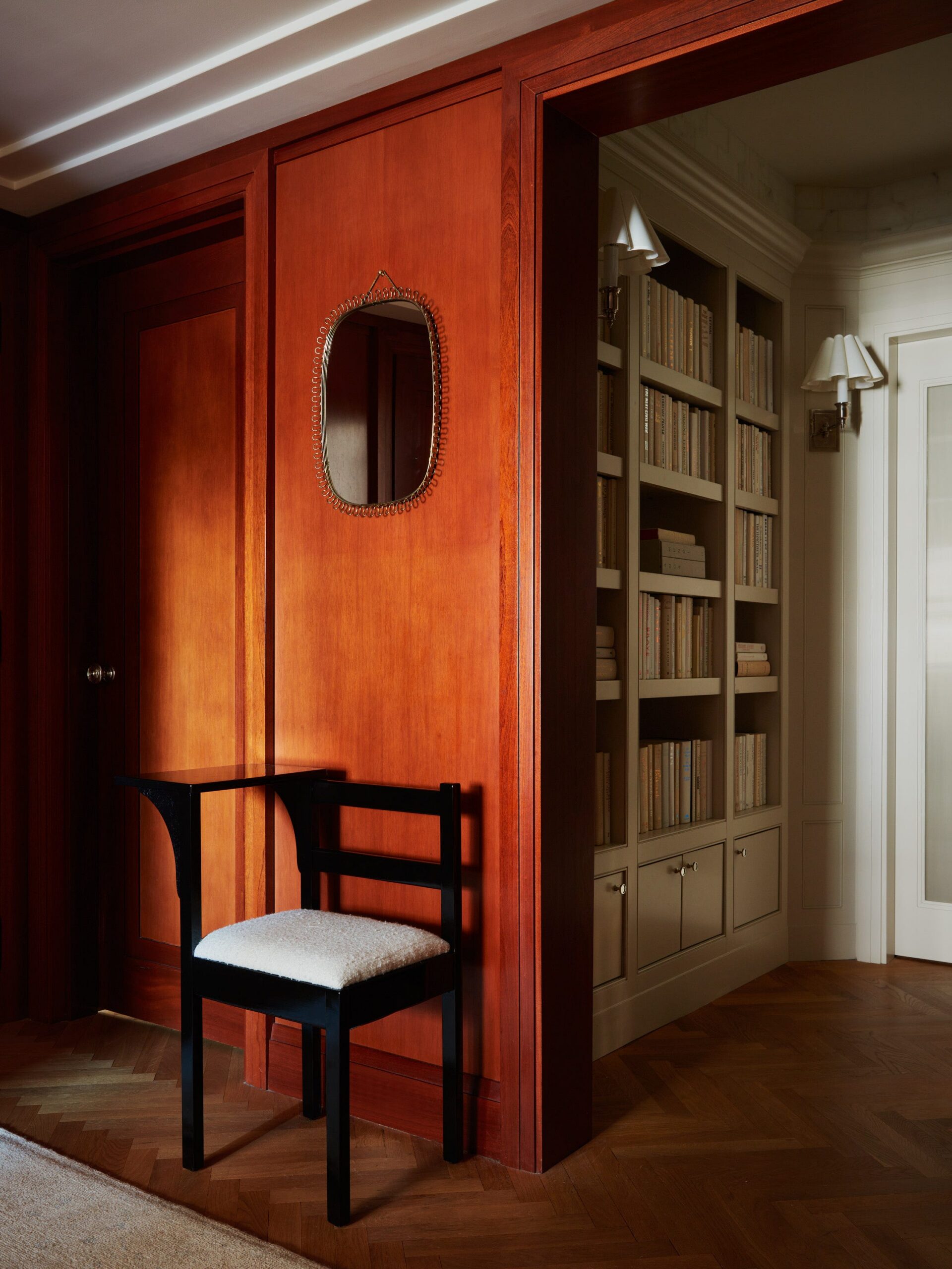 Black Chair with Sculptural Armrest for a Chic Pause